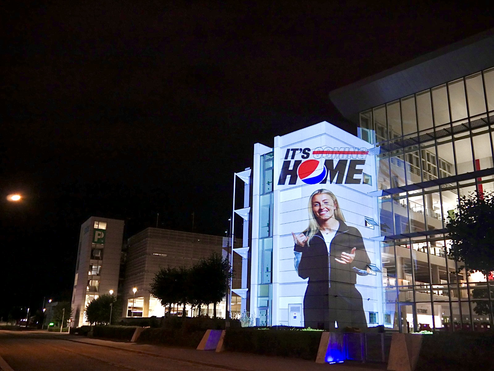 Large advertisement on building facade.