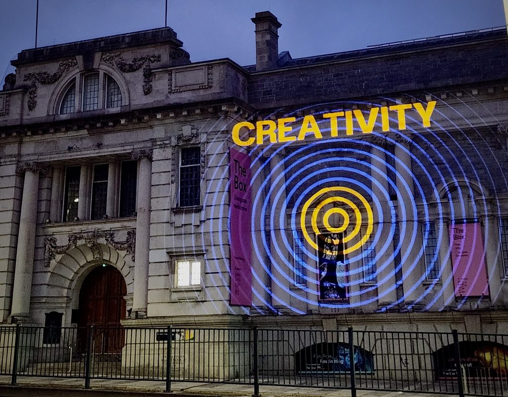 Getting your message across with Blackbeam projection onto The Box Museum in Plymouth UK