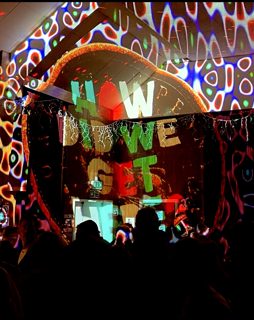 How did we get here? projection of artist's wok by Quiet British Accent