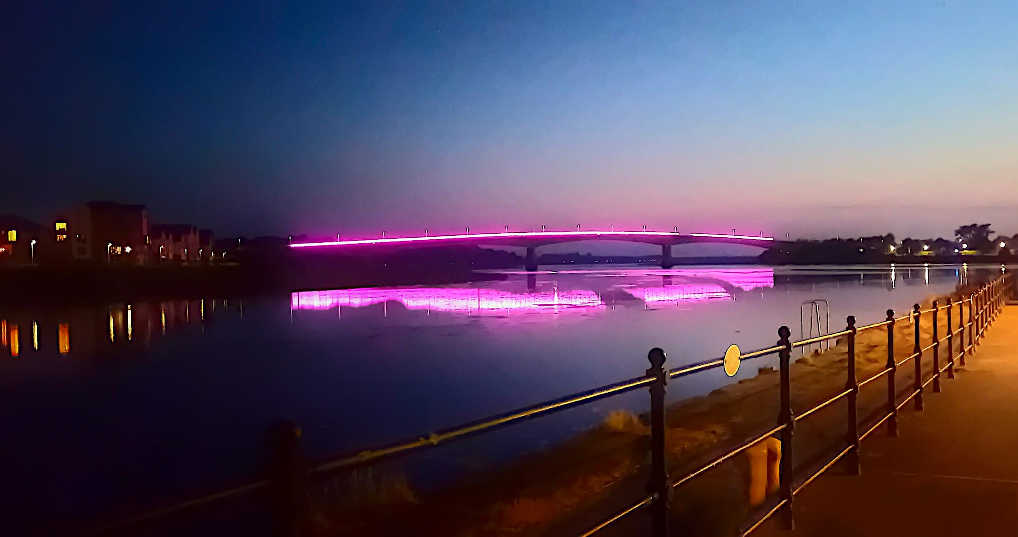 Pink neon bridge for North Devon Hospice Night Walk event